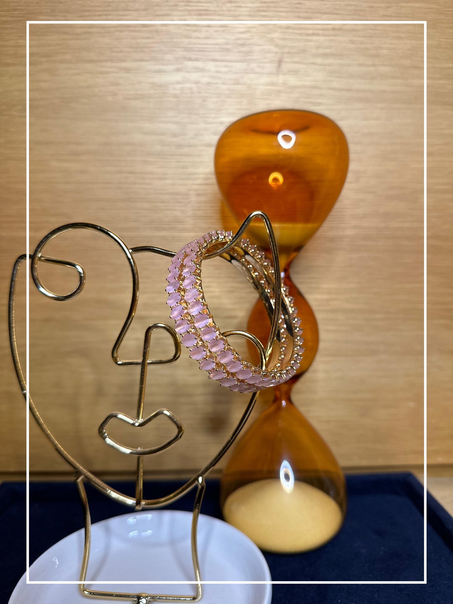 Elegant golden bangles with Baby Pink Stone - Set of 2. Perfect for both Traditional and indo-western look.