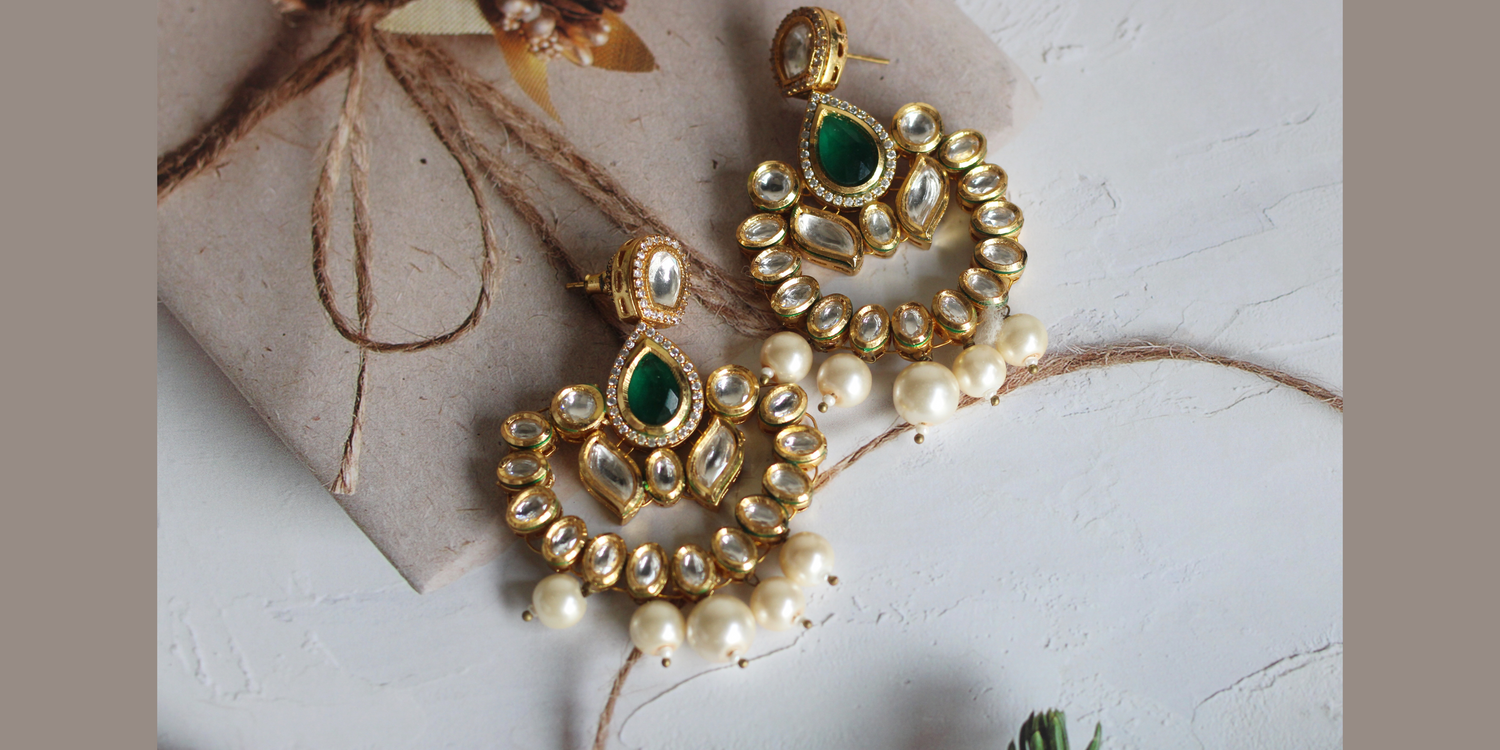 Traditional Kundan Chandbali Earrings with Pearls at the bottom.